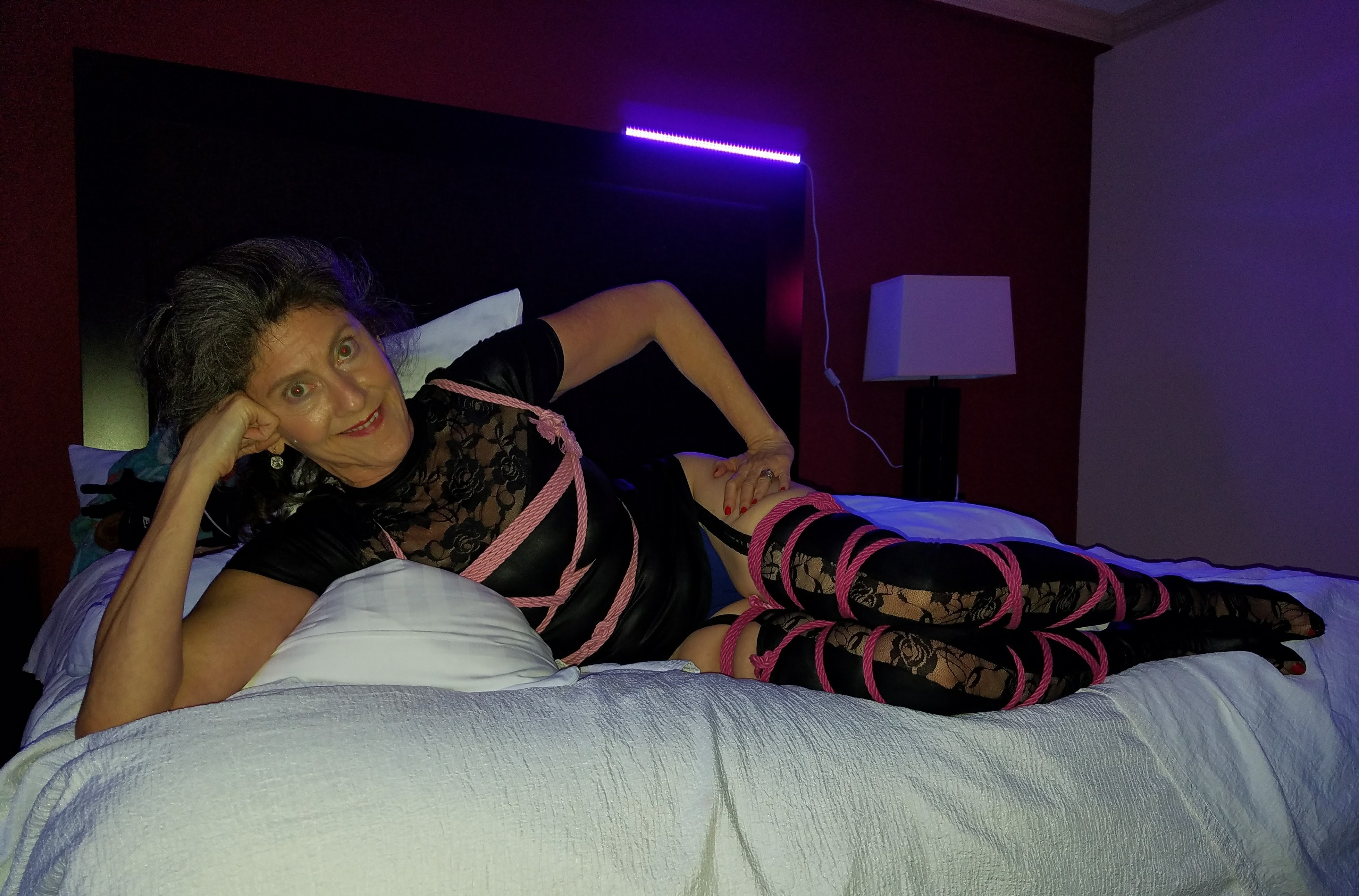 MadameSamanthaB, Lady Alice, Crimson Moon, Bound at a kinky party, Bound in pink rope, Bound in rope,